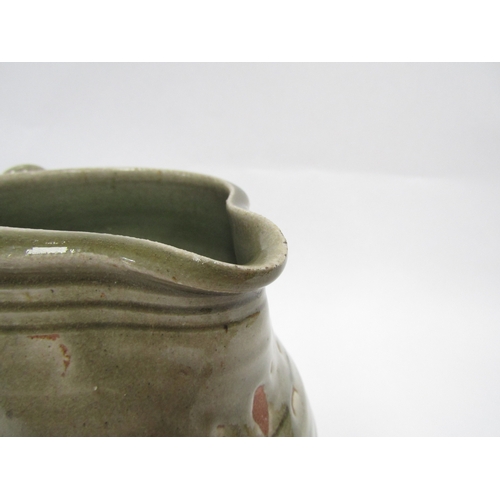 7093 - A St Ives standard ware pottery jug with green glaze, impressed Pottery seal only. 19cm high