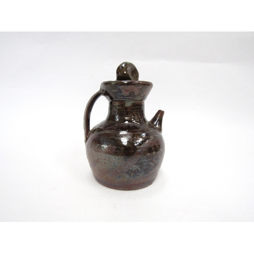 7092 - SETH CARDEW (1934-2016) A Wenford Bridge Pottery small pourer with screw top, tenmoku glaze. Impress... 