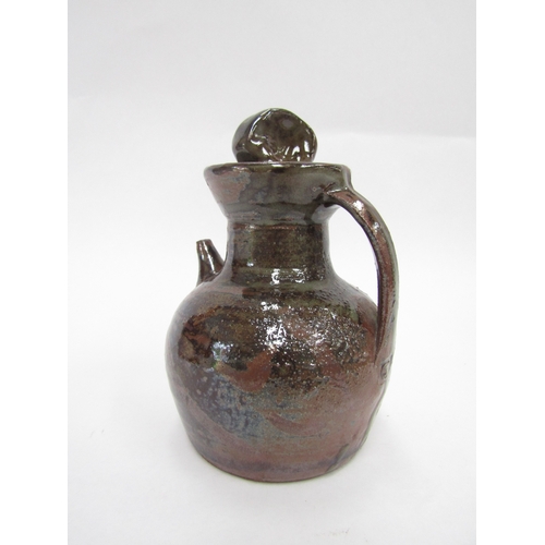 7092 - SETH CARDEW (1934-2016) A Wenford Bridge Pottery small pourer with screw top, tenmoku glaze. Impress... 