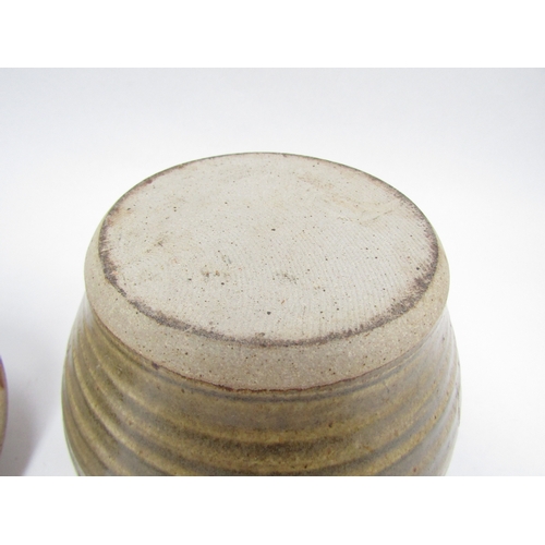 7144 - RICHARD BATTERHAM (1936-2021) A studio pottery lidded pot, greenish glaze and incised line detail. U... 