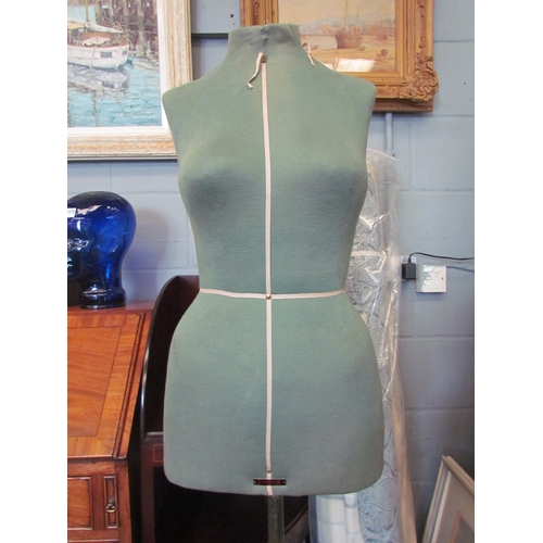 1035 - A Singer tailor's dummy on stand, 140cm tall