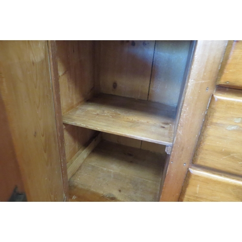 1091 - A Victorian stripped pine dresser base with a shelved plate rack and two keys, 211cm tall x 151cm wi... 