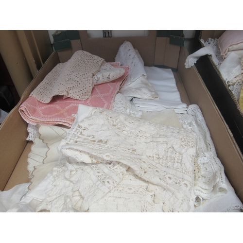 1409 - Two boxes of embroidered and crochet table linens and tea cosies        (E) £6-12