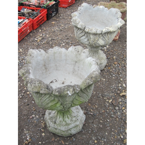 3404 - A pair of composition urns   (R) £40