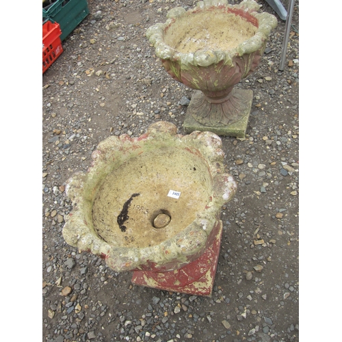 3405 - A pair of composition urns   (R) £40