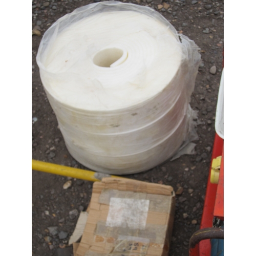 3479 - A roll of insulation and a box of hinges