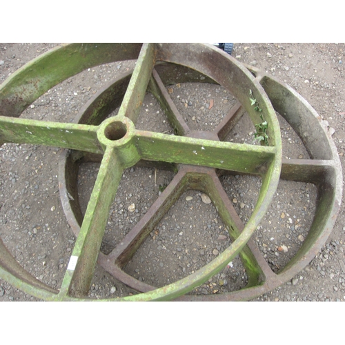 3491 - A pair of heavy cast iron wheels      (R) £300