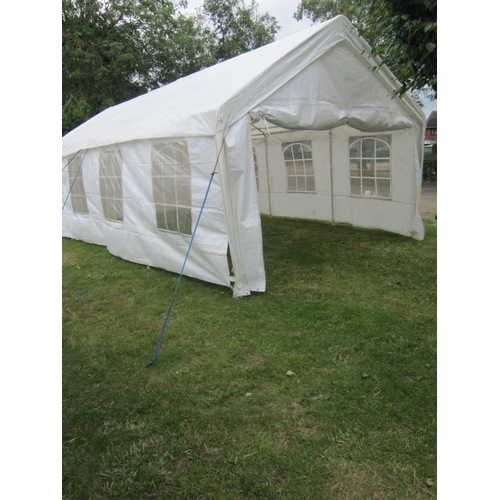 3538 - A marquee with side panels, approx. 25' x 13'