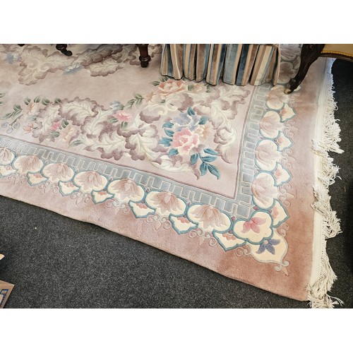 1475 - A Chinese rug with tassel ends, approx. 394cm x 276cm   (R) £25