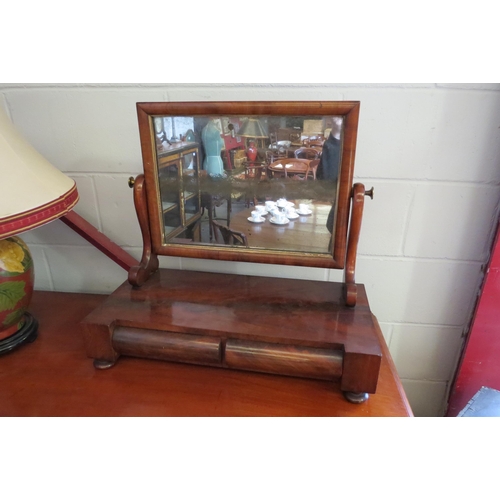 1006 - A Victorian mahogany two drawer toilet mirror on pad feet