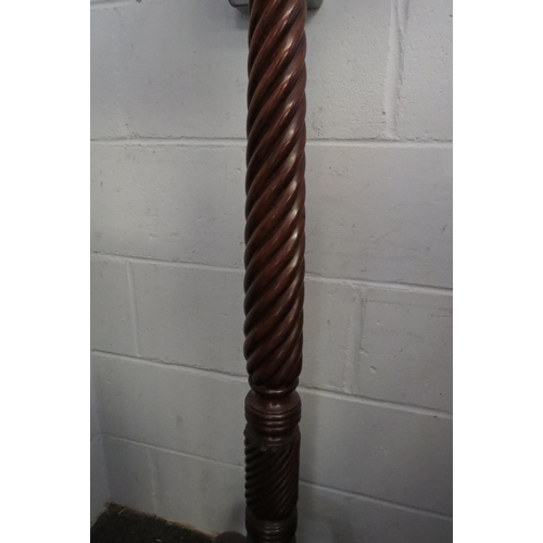 1009 - A Victorian mahogany torchiere stand, spiral twist column to a tripod base, 112cm tall