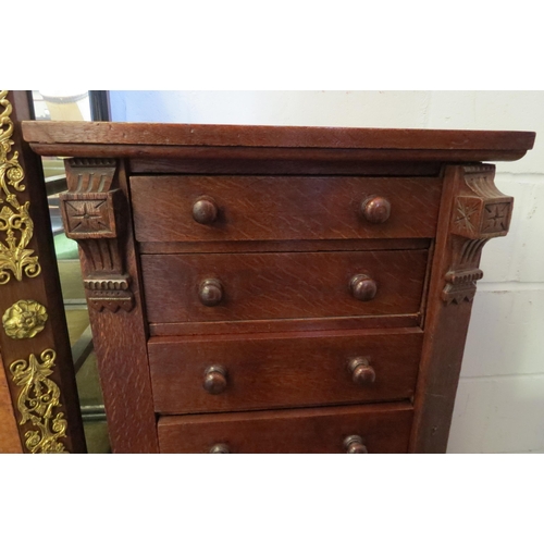 1015 - A late 19th Century oak Wellington chest of seven drawers (large split to side), 98cm tall x 50cm wi... 