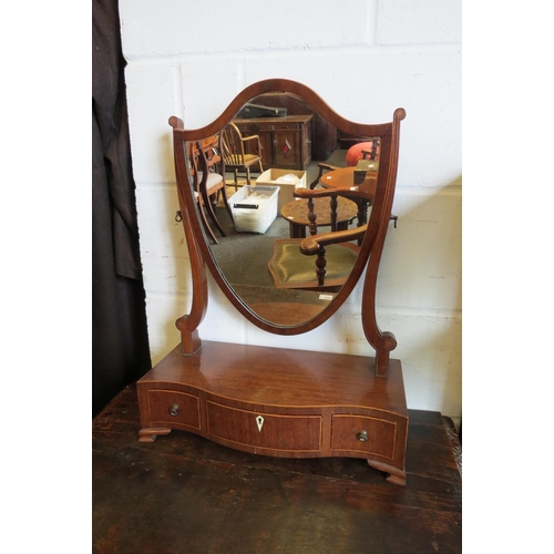 1024 - A 19th Century mahogany shield back table top mirror with jewellery drawers