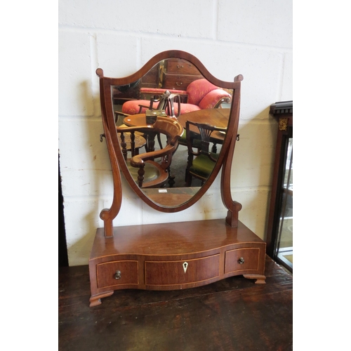 1024 - A 19th Century mahogany shield back table top mirror with jewellery drawers