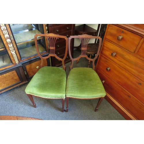 1027 - A set of four Edwardian inlaid mahogany chairs     (R) £30