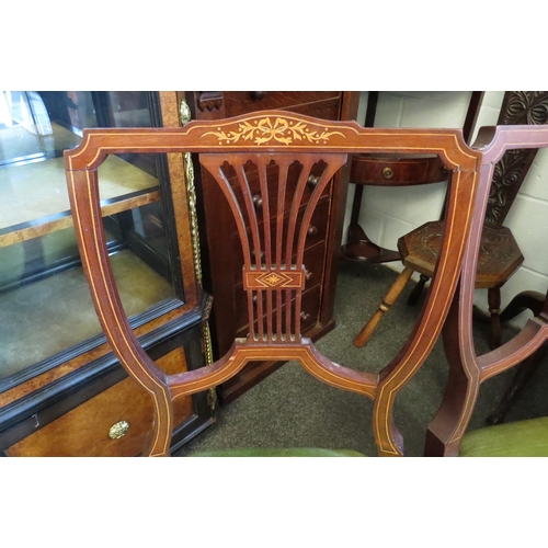 1027 - A set of four Edwardian inlaid mahogany chairs     (R) £30