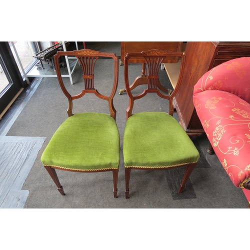 1027 - A set of four Edwardian inlaid mahogany chairs     (R) £30