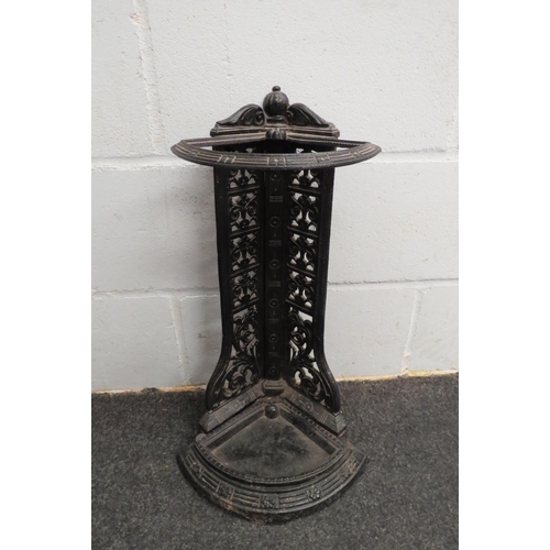 1066 - A Victorian style cast iron corner umbrella and stick stand, 58cm tall