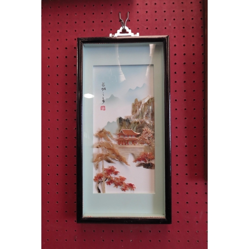 1068 - A shell relief picture of a Japanese pagoda scene.  Framed and glazed.  26cm x 12cm image size