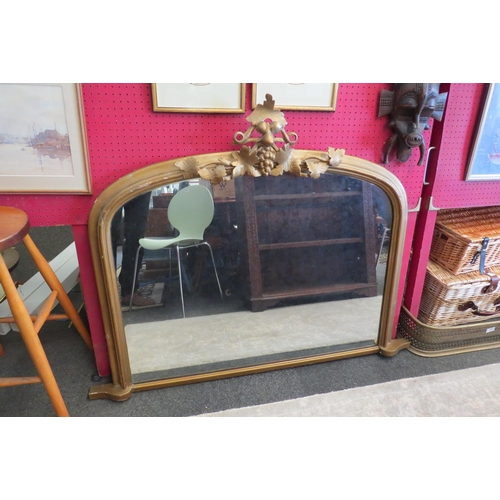 1076 - A gilt and gesso overmantel mirror with applied grapevine detail, 98cm x 125cm