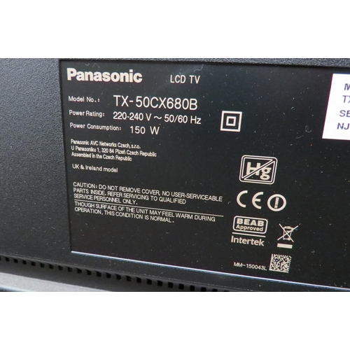 1086 - A Panasonic TV model TX-50CX680B with remote and accessories, 128cm with stand      (E) £50-100