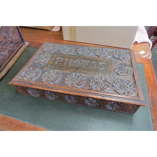 1097 - An early-mid 20th Century carved oak rectangular ‘Photos’ box with Tudor rose relief, 45.5cm wide