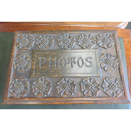 1097 - An early-mid 20th Century carved oak rectangular ‘Photos’ box with Tudor rose relief, 45.5cm wide