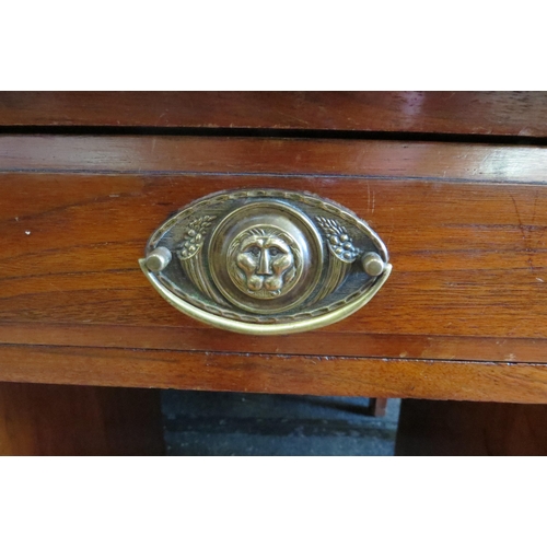 1100 - A circa 1900 walnut twin pedestal desk, nine drawer front set with brass handles, on plinth base, 76... 