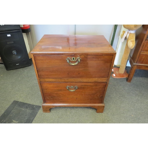 1106 - A Georgian mahogany two drawer chest on bracket feet, 70cm tall x 63cm wide x 42cm deep