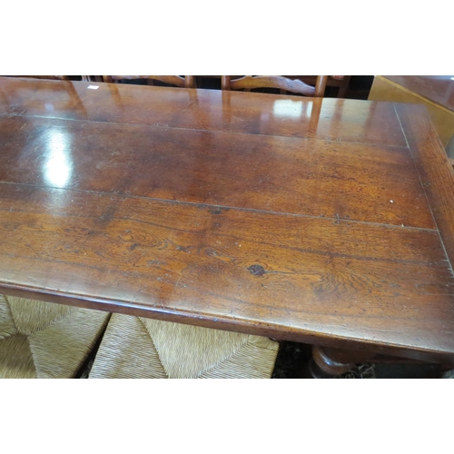 1120 - A reproduction country oak refectory dining table in the Jacobean style, plank top over heavy turned... 