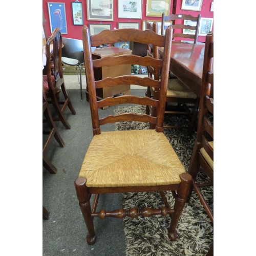 1120 - A reproduction country oak refectory dining table in the Jacobean style, plank top over heavy turned... 