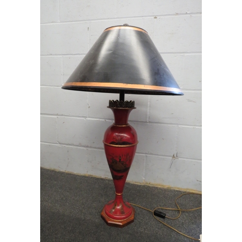 1126 - An Oriental red painted tin table lamp base with black shade