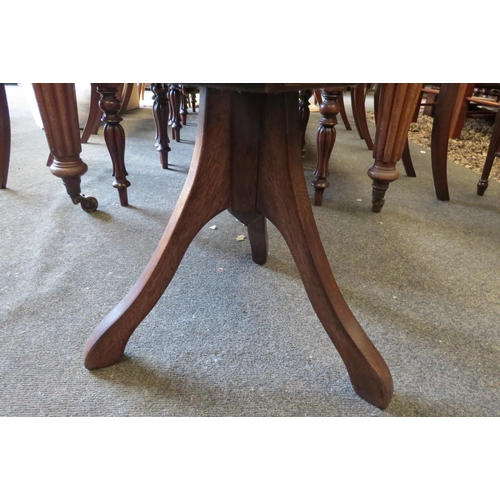 1127 - A leather embossed coffee table marked David 2001 to top, 44cm tall x 60cm diameter