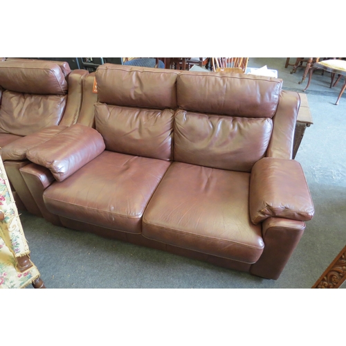 1144 - A brown leather two seater sofa     (R) £50