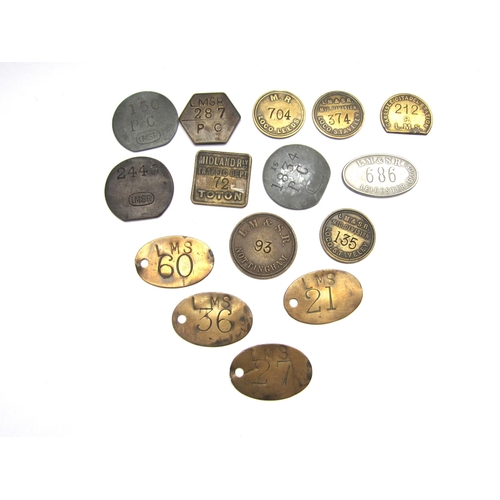 8144 - A quantity of twelve brass pay checks and tokens mostly relating to LMS, LM&SR and Carlisle Railway,... 