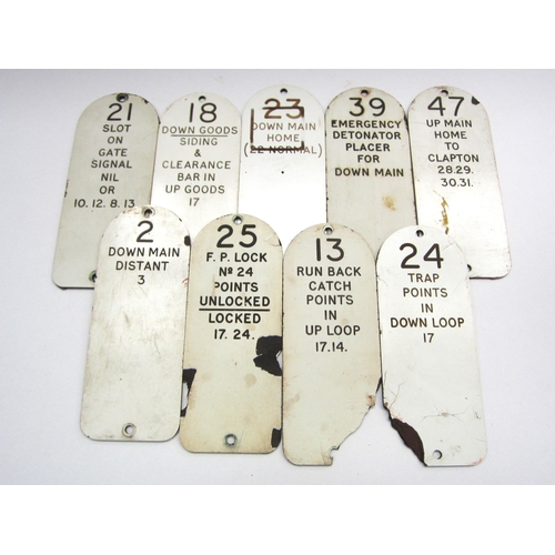 8150 - A quantity of traffolyte signal lever plates with several locations marked on the reverse including ... 