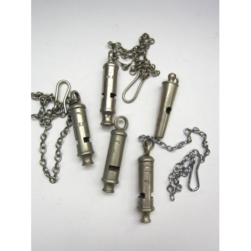 8161 - Four nickel plated metropolitan whistles and chains stamped LNER, GWR and CLC and a Beaufort whistle... 