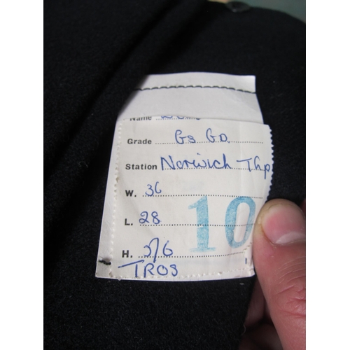 8167 - A BR overcoat, jacket and trousers with pinned label station 'Norwich Thorpe'