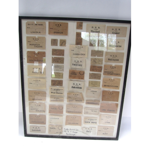 8200 - A framed and glazed display of various luggage labels and tickets, mostly relating to GER, LNER and ... 