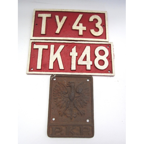 8219 - Three cast Polish Railway locomotive cabside plates, TY43, TK t48 and crest, longest 38cm