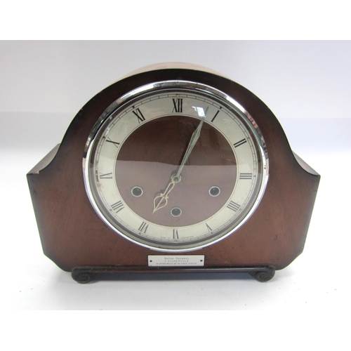 8222 - A mahogany mantle clock with roman numeral face and plaque 'British Railways A. Baskerville in appre... 