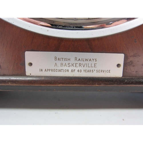 8222 - A mahogany mantle clock with roman numeral face and plaque 'British Railways A. Baskerville in appre... 