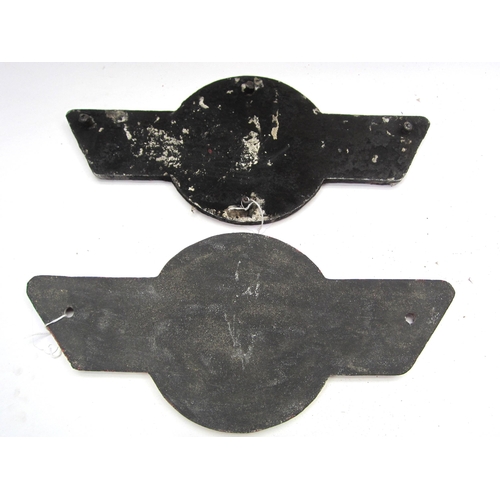 8223 - A pair of cast alloy Chinese wagon plates, dated 1970, 40cm long