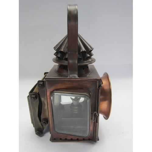 8232 - A set of three copper traction engine lamps, front pair with flared bulbous lenses and L/H and R/H s... 