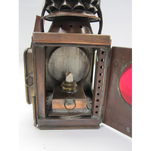 8232 - A set of three copper traction engine lamps, front pair with flared bulbous lenses and L/H and R/H s... 