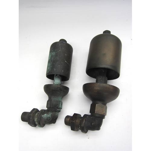 8236 - A pair of large and small GWR locomotive whistles, both on mounting elbows, one stamped GWR inside t... 