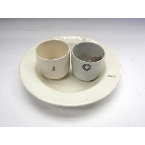 8243 - Three pieces of SR crockery including cups and a plate     (E) £10-15 BYGONES