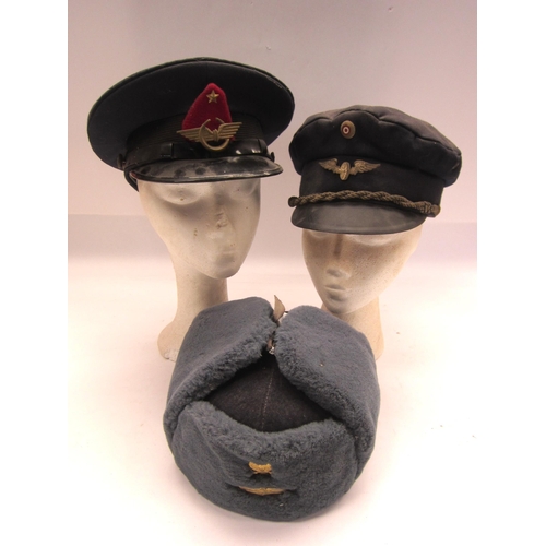 8246 - Three various railwaymans headwear including Soviet and Eastern European