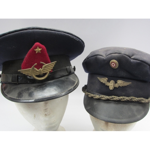 8246 - Three various railwaymans headwear including Soviet and Eastern European