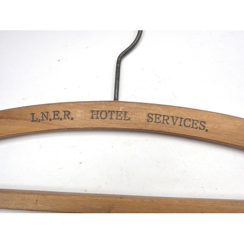 8247 - Two coat hangers marked GER Hotel and LNER Hotel Services